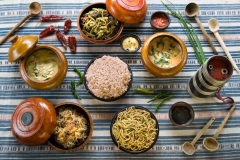 BHUTAN Rabten Restaurant serving traditional Bhutanese dishes. Red rice, buckwheat noodles, mushroom-cheese Datsi,  potato Datsi, dried beef with string beans and Vermicelli with mushrooms and some arra (spirit distilled from rice )